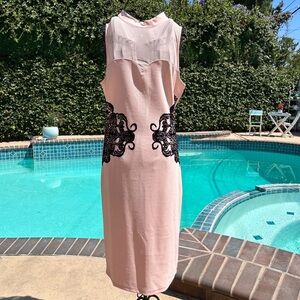 Elegant Pink Sleeveless Dress with Black Lace Accents